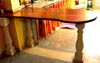 Tavolo isolotto realizzato in legno massello con sostegni in pietra leccese cm 60 x 150 x  3,5   COD. 009
